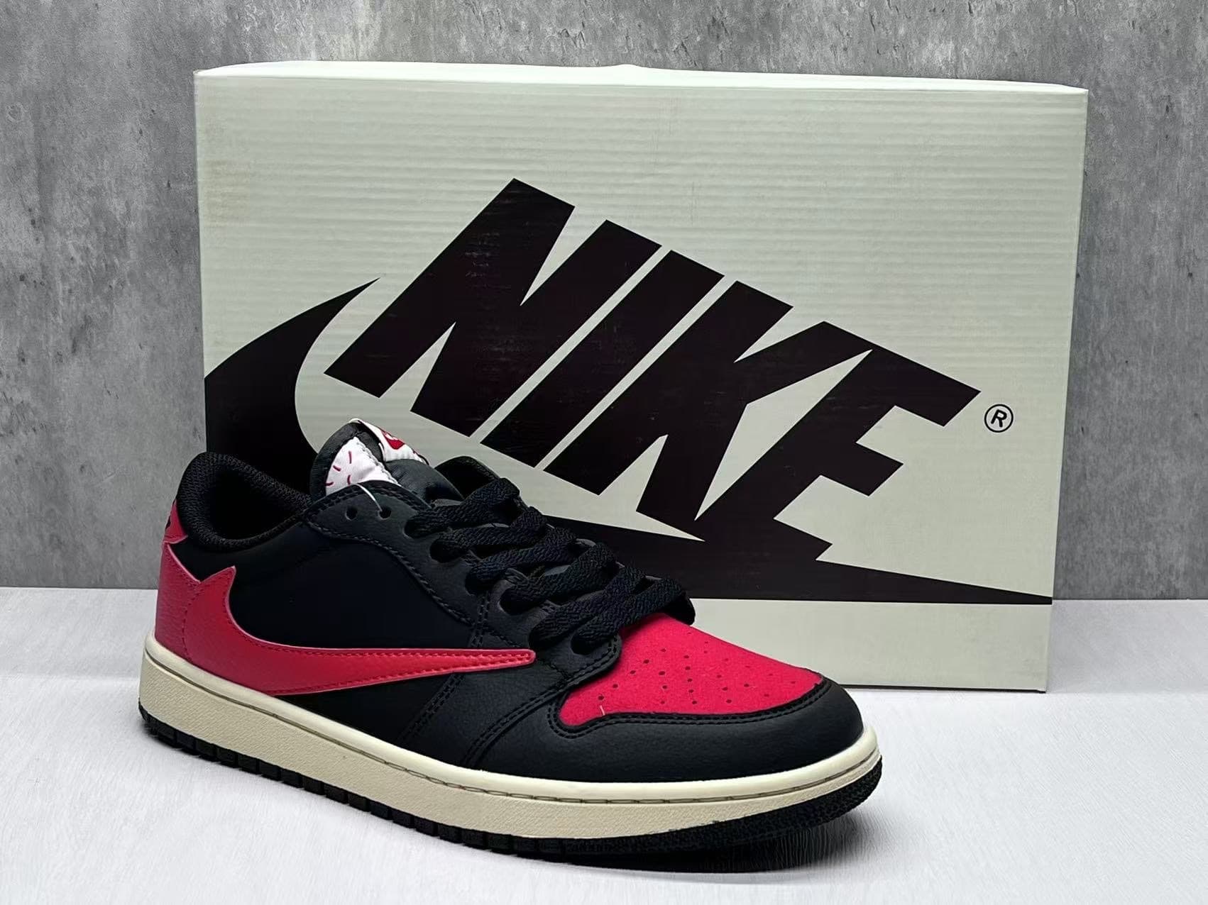 Air Jordan 1 Black/Red Swoosh.