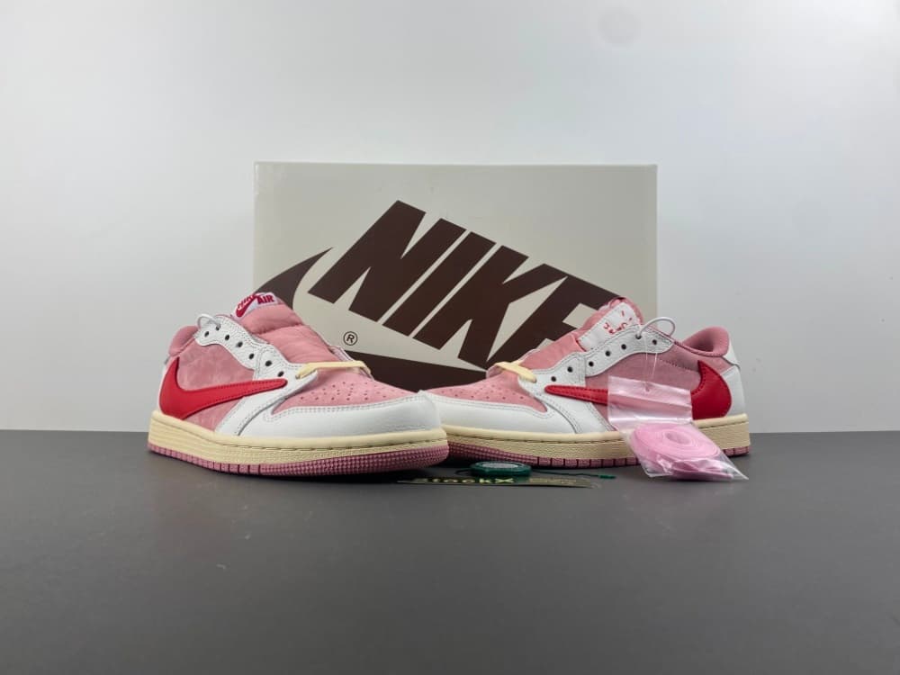 Ravis Scott x Air Jordan 1 Low OG, white, pink, red Swoosh low-top sneakers.