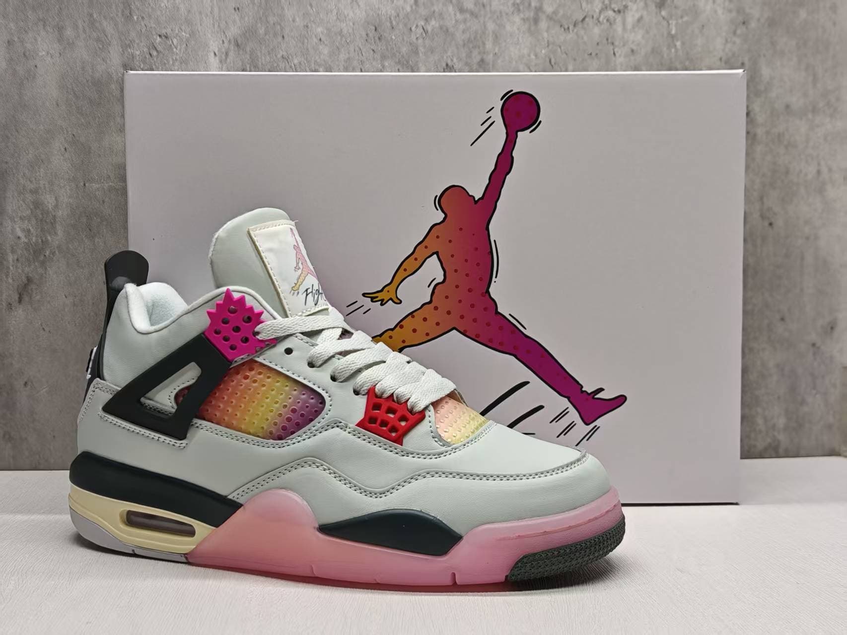 Air Jordan 4 Gradient Rainbow Pink Collab Limited Edition.