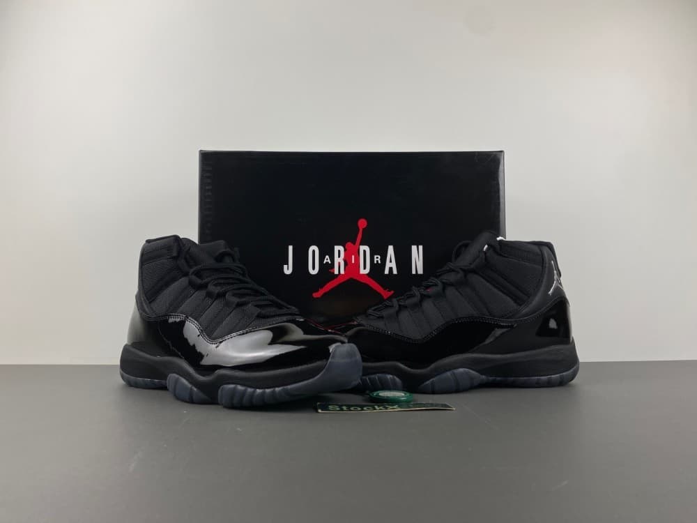 Air Jordan 11 in full black, blue, and red.