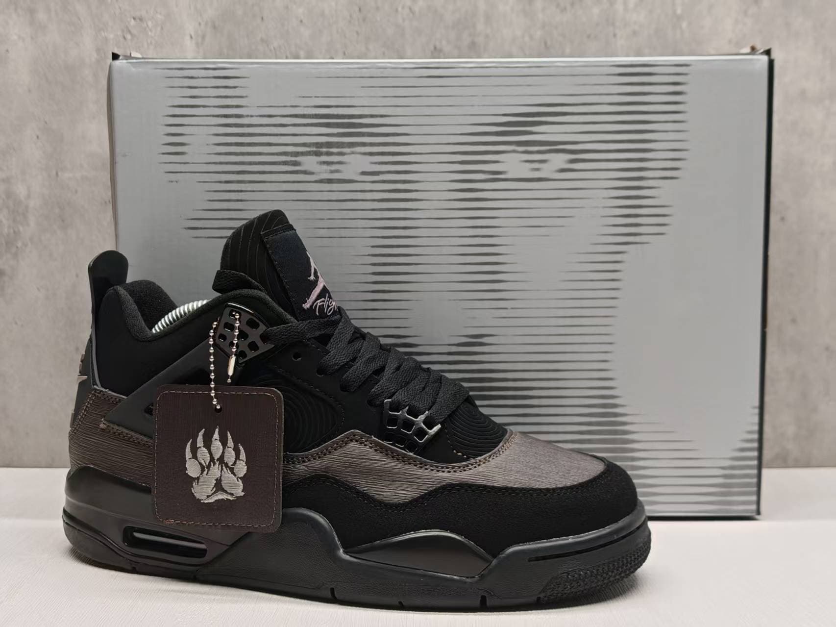 Air Jordan 4 Black/Brown Toe Marking Limited Edition.