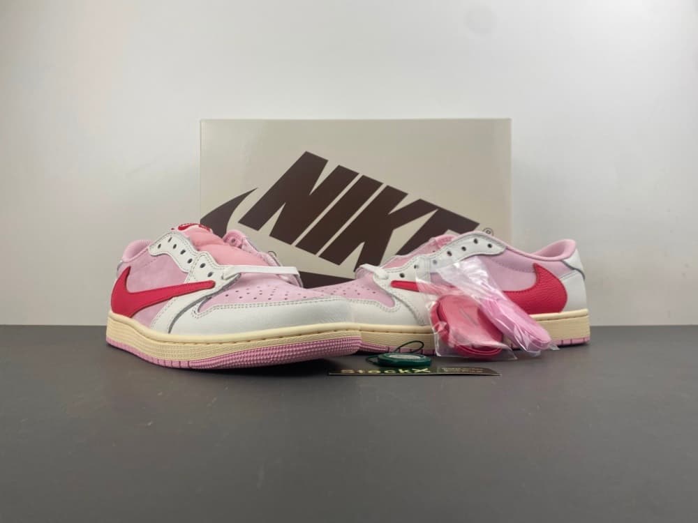 Version A! Travis Scott × AJ1 Low “Shy Pink” – pink and white Swoosh low-top sneakers.