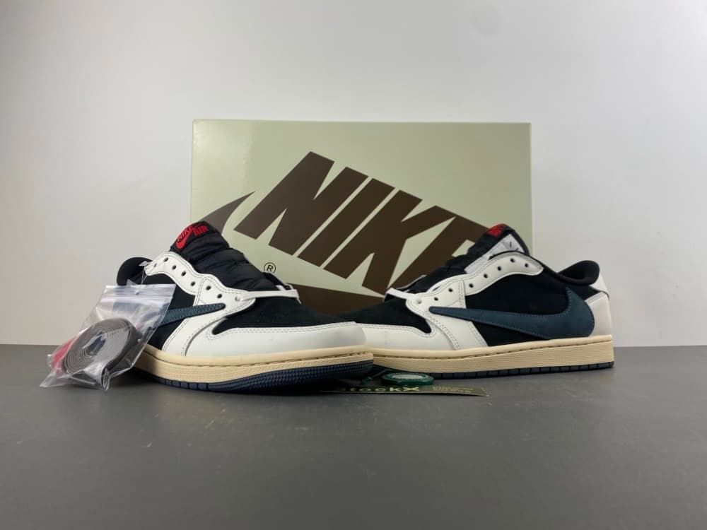 Version 21! Travis Scott x Air Jordan 1 Low-top in black, white, dark blue with Swoosh.